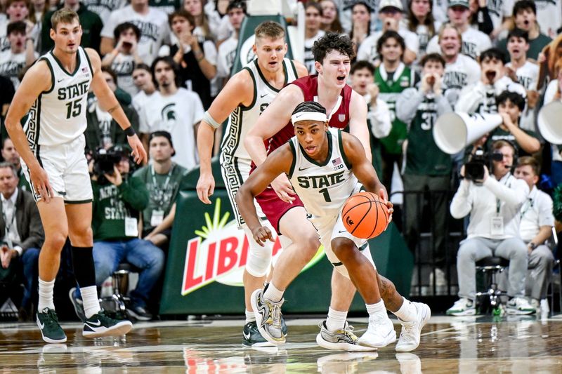 Michigan State's Jeremy Fears Jr. takes off after a steal against Colgate during the first half on Monday, Nov. 3, 2025, at the Breslin Center in East Lansing.