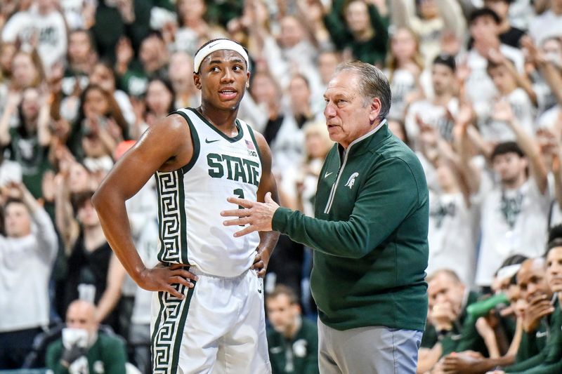 Michigan State's coach Tom Izzo, right, talks with Jeremy Fears Jr. during the first half against Colgate on Monday, Nov. 3, 2025, at the Breslin Center in East Lansing.
