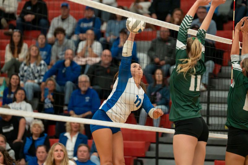 Harper Creek senior Taegen Anderson spikes during a playoff game against Pennfield at Vicksburg High School on Monday, Nov. 3, 2025.