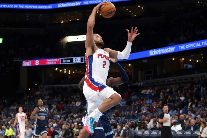 Nov 3, 2025; Memphis, Tennessee, USA; Detroit Pistons guard Cade Cunningham (2) drives to the basket during the first quarter against the Memphis Grizzlies at FedExForum. Mandatory Credit: Petre Thomas-Imagn Images