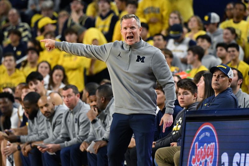 Nov 3, 2025; Ann Arbor, Michigan, USA; Michigan Wolverines head coach Dusty May yells during the first half against the Oakland Golden Grizzlies at Crisler Center. Mandatory Credit: Lon Horwedel-Imagn Images