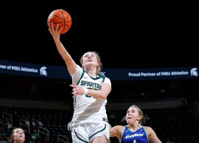 Michigan State's Kennedy Blair gets a fast-break layup against Mercyhurst's Shannon Heine, Tuesday, Nov. 4, 2025, in East Lansing.