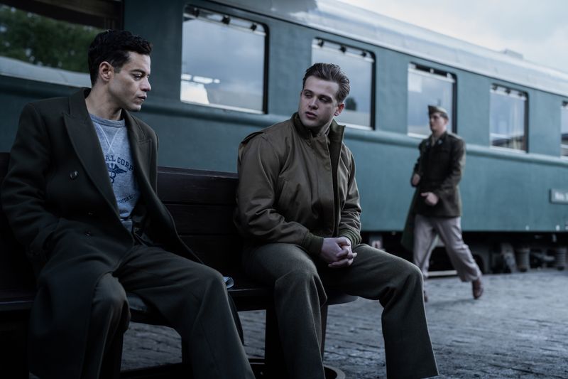 Douglas (Rami Malek, left) shares an emotional moment with translator Howie (Leo Woodall) in the historical drama "Nuremberg."