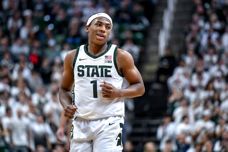 Michigan State's Jeremy Fears Jr. looks at Colgate's bench after his steal and score during the first half on Monday, Nov. 3, 2025, at the Breslin Center in East Lansing.