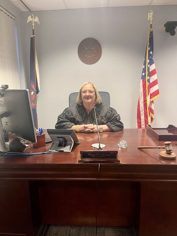 Cheryl Sweeney is shown in her at her bench.