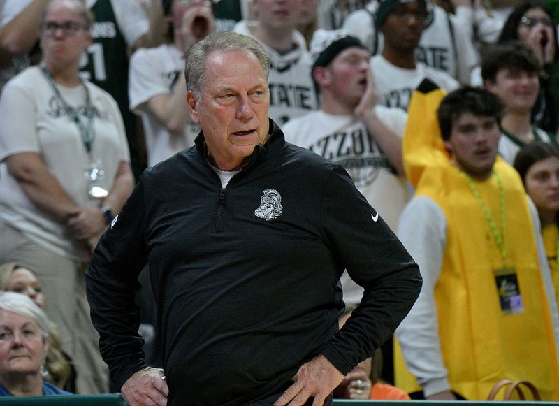 Nov 8, 2025; East Lansing, Michigan, USA; Michigan State Spartans head coach Tom Izzo watches his squad against Arkansas during the first half at Jack Breslin Student Events Center. Mandatory Credit: Dale Young-Imagn Images