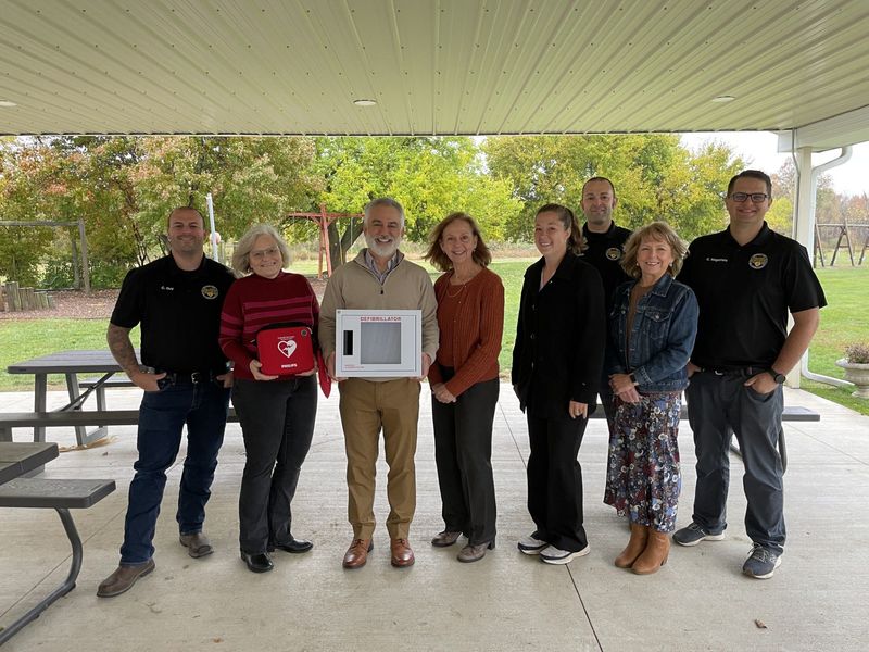 Members of Monroe Community Heartsavers recently donated an AED and wall case to the staff at Meadow Montessori School in Raisin Township.