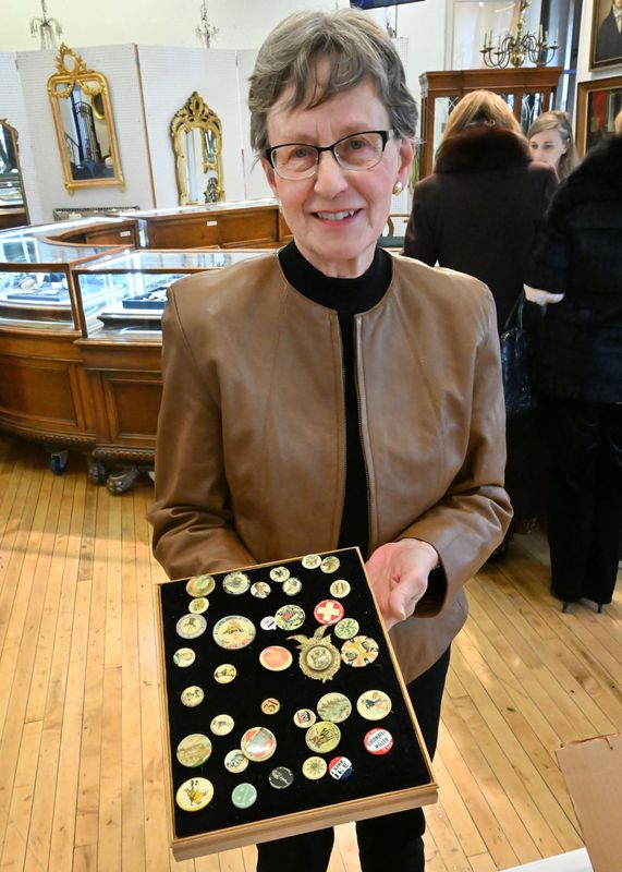 Janet Vanderpool brought in a tray of buttons to Trash or Treasure, apprising readers pieces of art, at DuMouchelles auction house in Detroit, Michigan on November 11, 2025.
