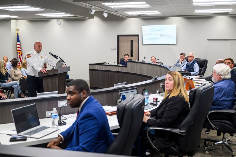 Grand Blanc Township Fire Chief Jamie Jent presents a proposal for an increase in staffing within the fire department during a meeting of the Grand Blanc Township Board of Trustees on Tuesday, Nov. 11, 2025 in Grand Blanc Township.