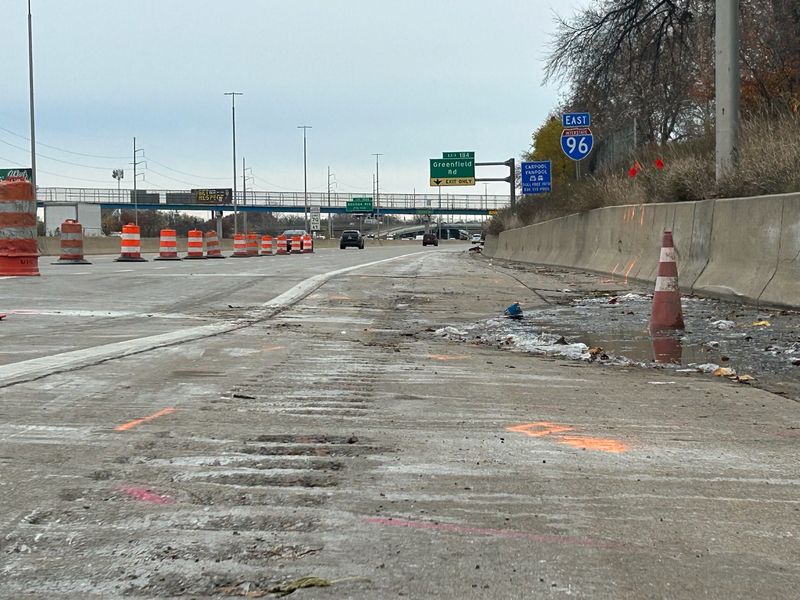 Two developing sinkholes are shown in the two right lanes and shoulder of the Southfield Freeway ramps to eastbound I-96 the week of Nov. 10. The sinkholes aren't obvious in appearance - it's the undermined earth below that is the risk, said an MDOT spokeswoman.