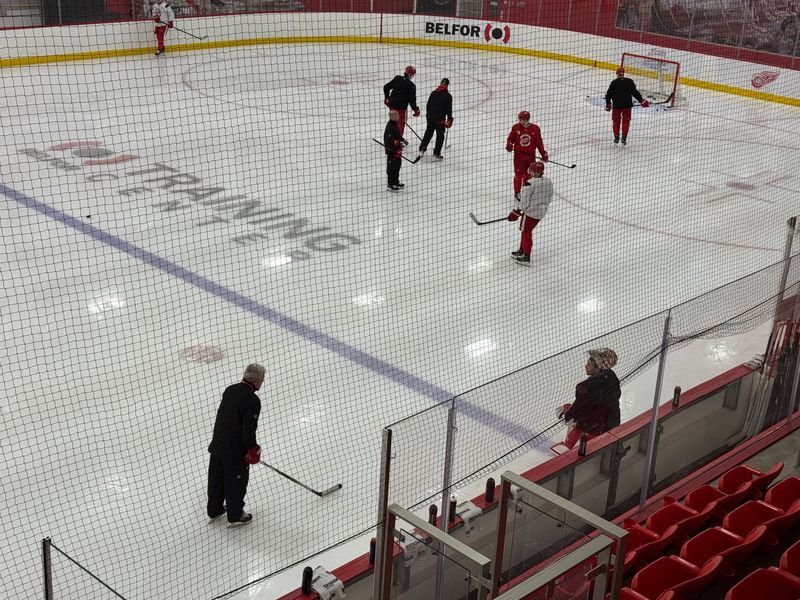Goaltender John Gibson talks with coach Todd McLellan during Detroit Red Wings practice on Friday, Nov. 14, 2025 at Little Caesars Arena in Detroit.