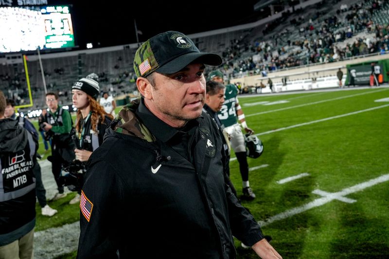 Michigan State's head coach Jonathan Smith leaves the field after the game against Penn State after the game on Saturday, Nov. 15, 2025, at Spartan Stadium in East Lansing.