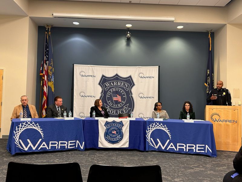 Warren Police Commissioner Eric Hawkins, standing, discusses data from the first four months of Operation Cycle Break, an initiative launched in Warren to reduce domestic violence in the city, during a news conference Nov.18, 2025, inside Warren city hall.
