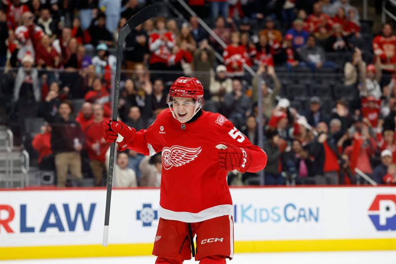 Detroit Red Wings center Emmitt Finnie (58) celebrates a goal in the second period against the Seattle Kraken at Little Caesars Arena in Detroit on Tuesday, Nov. 18, 2025.