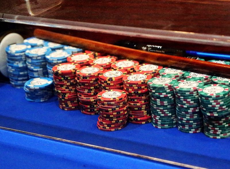 Chips are piled up on a craps table at Ocean Gaming casino in Hampton Beach.