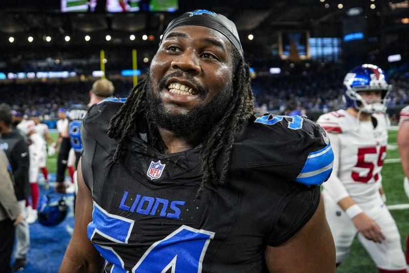 Detroit Lions defensive tackle Alim McNeill (54) celebrates 34-27 win over New York Giants at Ford Field in Detroit on Sunday, Nov. 23, 2025.