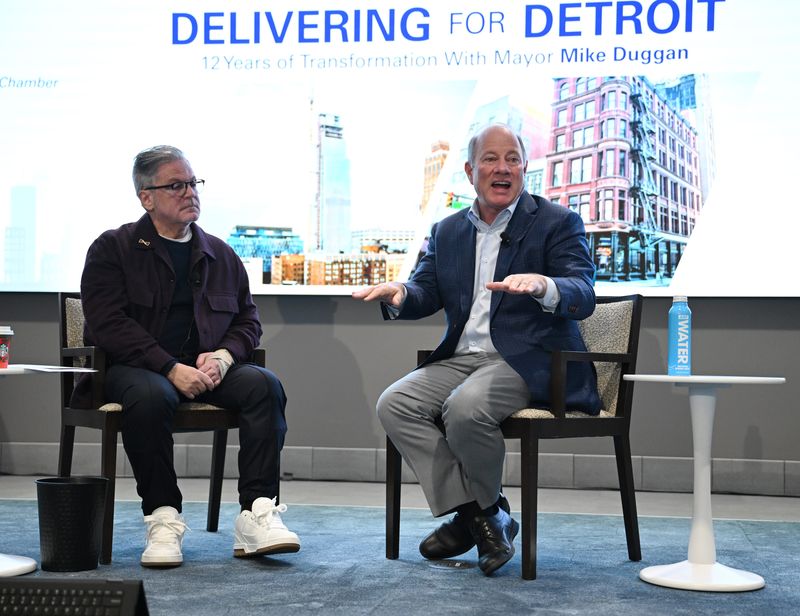 From L to R, Billionaire Dan Gilbert and Mayor Mike Duggan, interact during their fireside chat, during the Detroit Regional Chamber celebration of the outgoing mayor's 12 years of collaborative progress event on November 25, 2025, in Detroit, MI.
