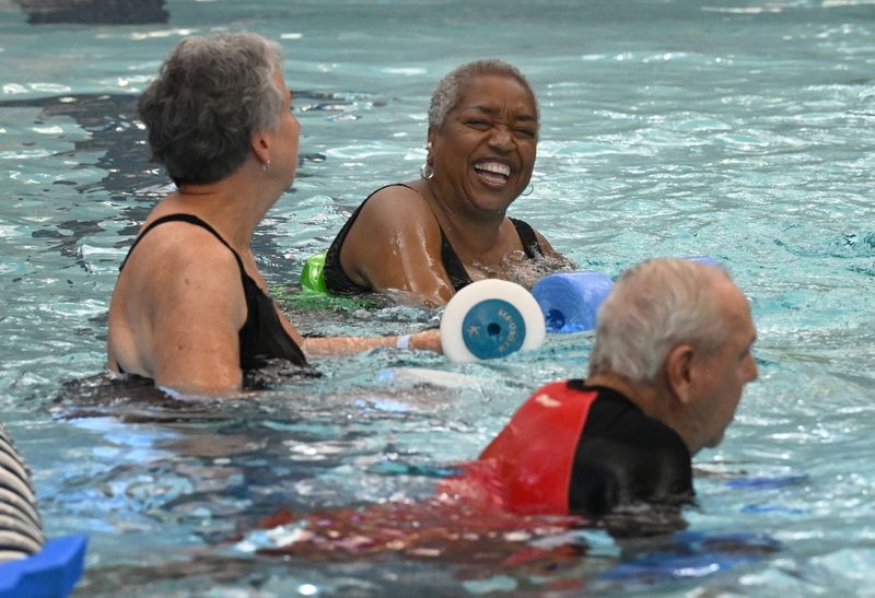 Meta Kern and other seniors participate in an aquatic exercise class at Rochester's OPC Social and Activity Center, which is partially funded via a senior millage. Many communities in Metro Detroit are increasing funding for senior services as Michigan's population ages.