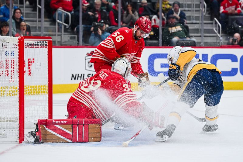 Detroit Red Wings defenseman Erik Gustafsson (56) defends as goaltender Cam Talbot (39) makes a save on Nashville Predators right wing Ozzy Wiesblatt (89) during the first period at Little Caesars Arena in Detroit on Wednesday, Nov. 26, 2025.