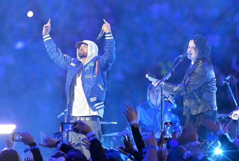 Eminem, left, joins Jack White on stage during the halftime performance.