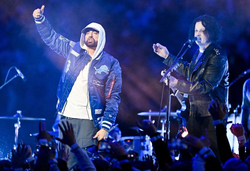 Nov 27, 2025; Detroit, Michigan, USA; Eminem and Jack White perform during halftime of the game between the Green Bay Packers and Detroit Lions at Ford Field.