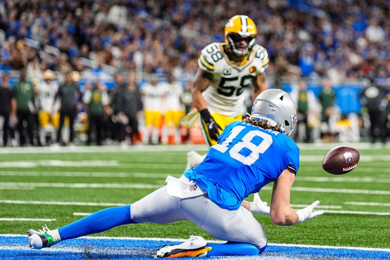 Detroit Lions wide receiver Isaac TeSlaa (18) makes a catch for a touchdown against Green Bay Packers during the second half at Ford Field in Detroit on Thursday, Nov. 27, 2025.