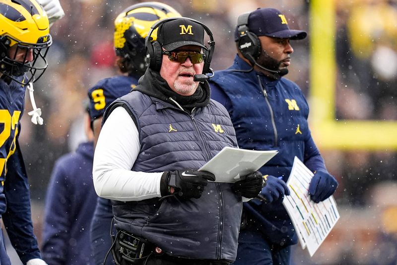 Michigan defensive coordinator Wink Martindale watches a play against Ohio State during the first half at Michigan Stadium in Ann Arbor on Saturday, Nov. 29, 2025.
