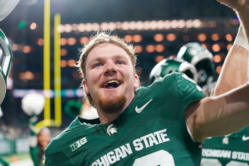 Michigan State punter Ryan Eckley (98) celebrates against Maryland after winning 38-28 at Ford Field in Detroit on Saturday, Nov. 29, 2025.
