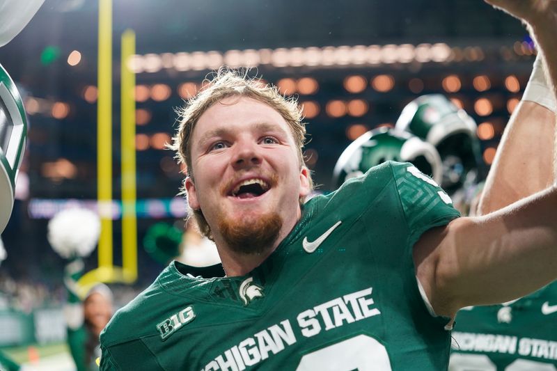 Michigan State punter Ryan Eckley (98) celebrates against Maryland after winning 38-28 at Ford Field in Detroit on Saturday, Nov. 29, 2025.