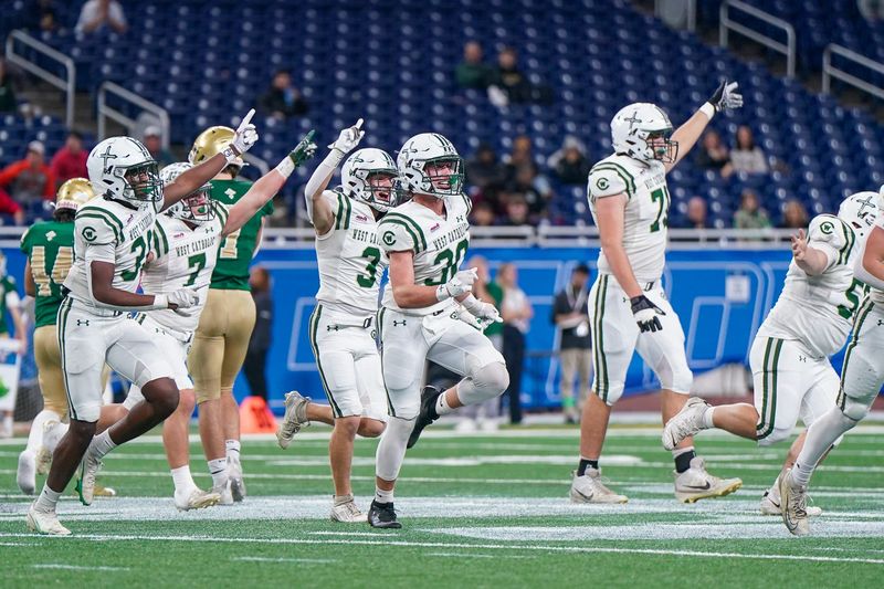 Grand Rapids West Catholic celebrates against Pontiac Notre Dame Prep during the first half in the Division 5 State Championship at Ford Field on Sunday, Nov. 30, 2025.