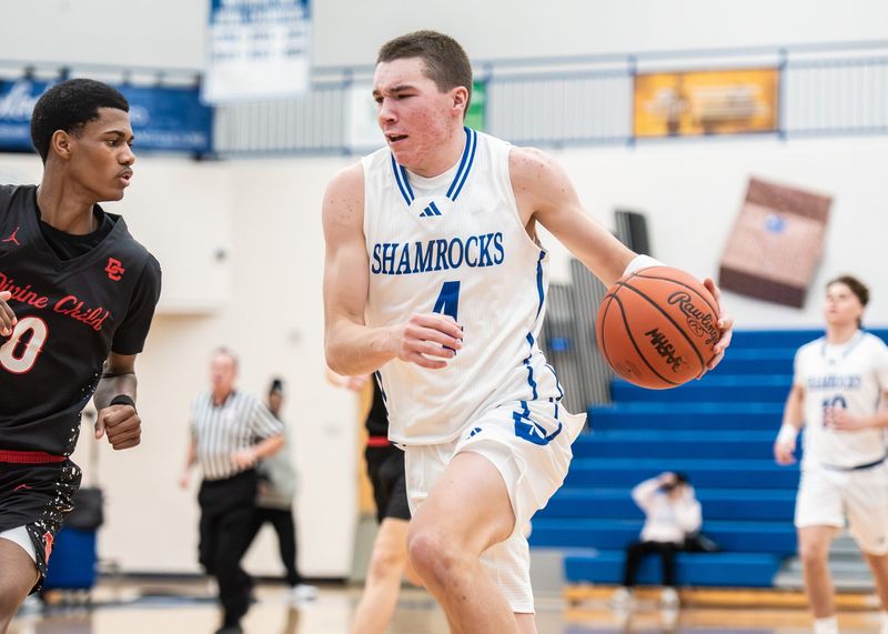 Detroit Catholic Central's Andrew Walker dribbles up the floor during a Catholic League crossover boys basketball game on Saturday, Dec. 6, 2025.