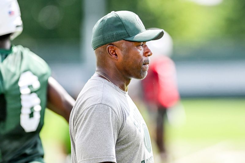 Michigan State's wide receivers coach Courtney Hawkins looks on during the first day of football camp on Tuesday, July 30, 2024, in East Lansing.