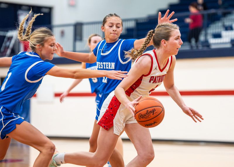 Livonia Franklin's Kinsey Nordbeck dribbles up the floor during a girls basketball game on Wednesday, Dec. 10, 2025.