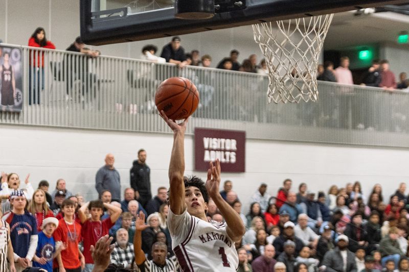 Holland Christian's Titus Spencer had the game-sealing steal on Tuesday.