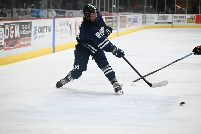 Marysville's Nathan Green passes the puck during a game earlier this season.