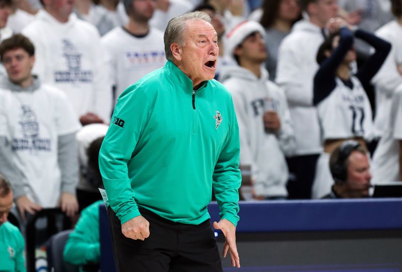 Dec 13, 2025; University Park, Pennsylvania, USA; Michigan State Spartans head coach Tom Izzo reacts from the bench during the first half against the Penn State Nittany Lions at Bryce Jordan Center. Mandatory Credit: Matthew O'Haren-Imagn Images