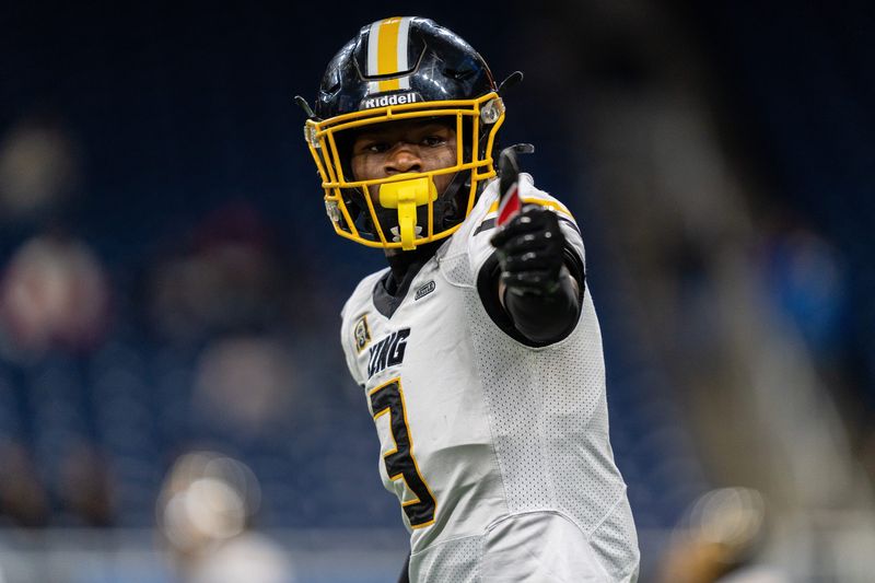 Detroit King Darryl Flemister (3) gives a thumbs up to the sideline as he lines up on the line of scrimmage during the Prep Bowl against Detroit Catholic Central at Ford Field in Detroit on Saturday, Oct. 25, 2025.