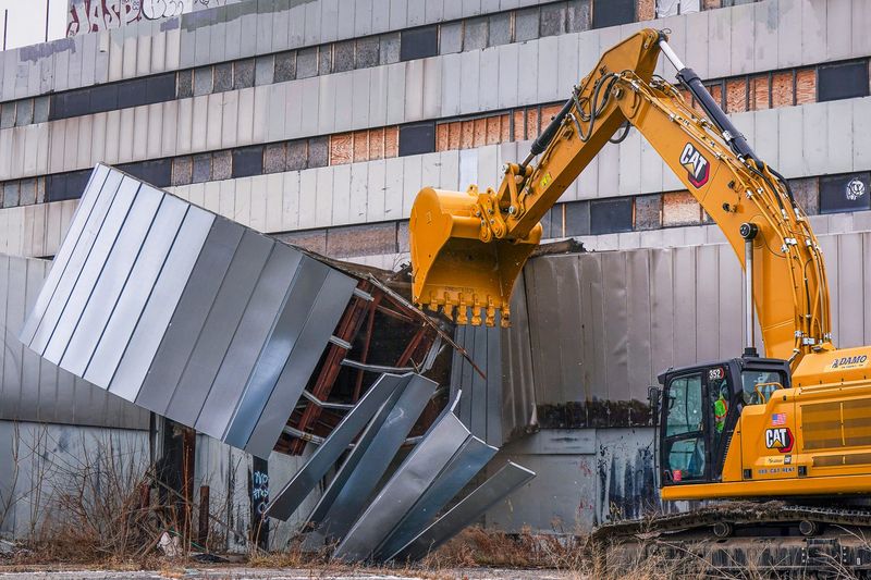As the Detroit City Football Club prepares to build a new stadium in its place, demolition begins on the Southwest Detroit Hospital in Detroit on Friday, Dec. 19, 2025.