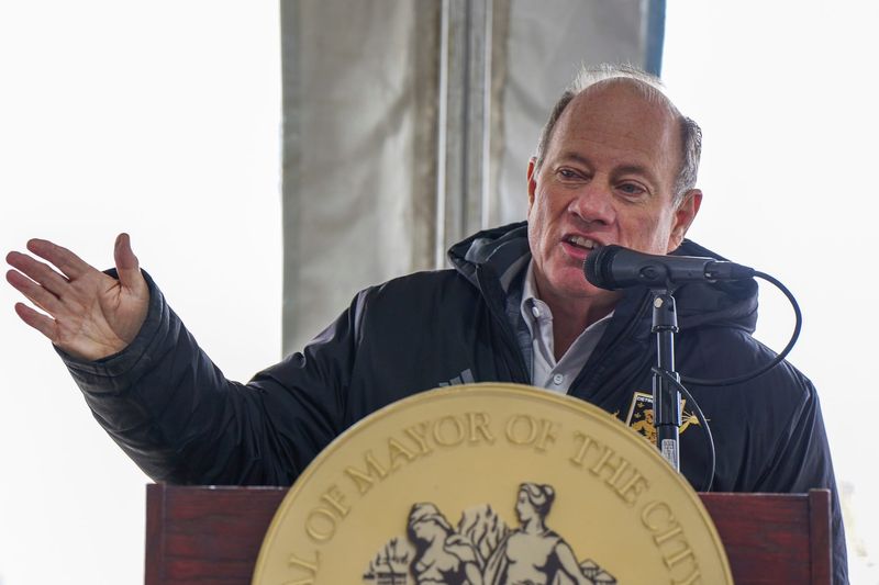 Mayor Mike Duggan speaks before demolition begins on the Southwest Detroit Hospital in Detroit on Friday, Dec. 19, 2025. The Detroit City Football Club prepares to build a new stadium in its place.