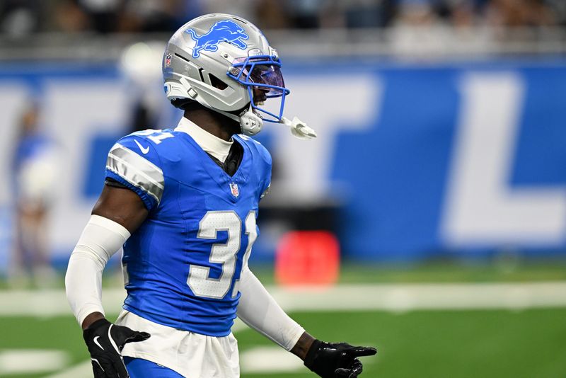 Sep 14, 2025; Detroit, Michigan, USA; Detroit Lions safety Kerby Joseph (31) celebrates after an interception against the Chicago Bears during the second quarter of the game at Ford Field. Mandatory Credit: Lon Horwedel-Imagn Images