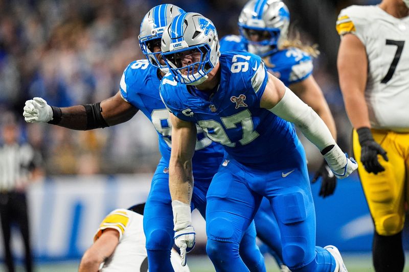 Detroit Lions defensive end Aidan Hutchinson (97) celebrates a sack against Pittsburgh Steelers during the first half at Ford Field in Detroit on Sunday, Dec. 21, 2025.