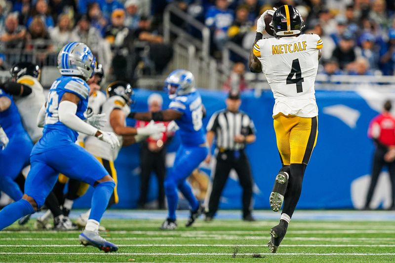 Pittsburgh Steelers wide receiver DK Metcalf makes a catch against the Detroit Lions during the first half at Ford Field in Detroit on Sunday, Dec. 21, 2025.
