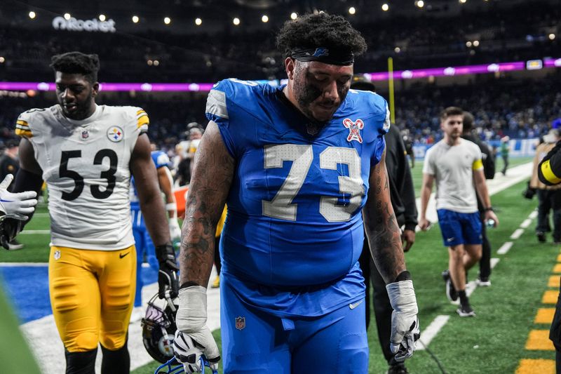 Detroit Lions guard Christian Mahogany (73) walks off the field after 29-24 loss to Pittsburgh Steelers at Ford Field in Detroit on Sunday, Dec. 21, 2025.