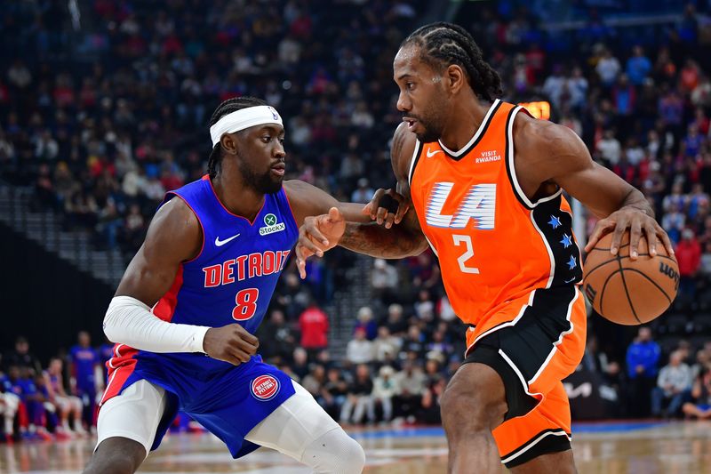 Los Angeles Clippers forward Kawhi Leonard (2) moves the ball against Detroit Pistons guard Caris Levert (8) during the first half at Intuit Dome in Inglewood, California, on Sunday, Dec. 28, 2025.