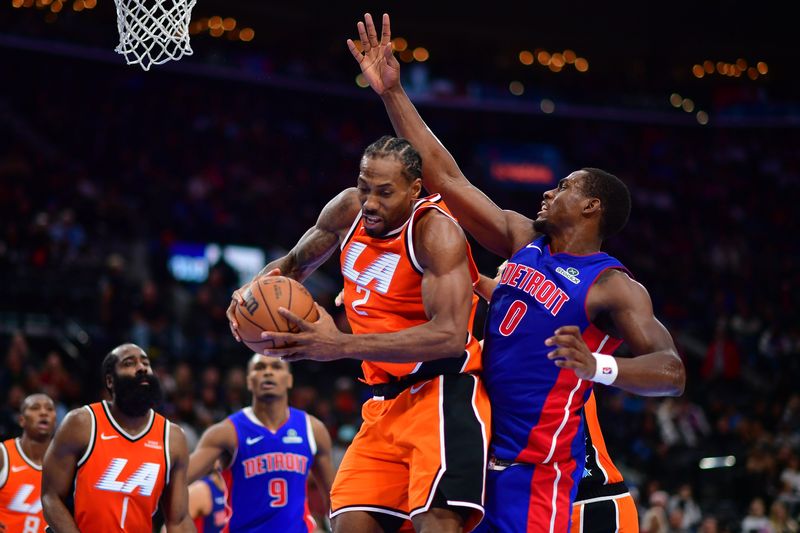 Los Angeles Clippers forward Kawhi Leonard (2) gets the rebound against Detroit Pistons center Jalen Duren (0) during the second half at Intuit Dome in Inglewood, California, on Sunday, Dec. 28, 2025.