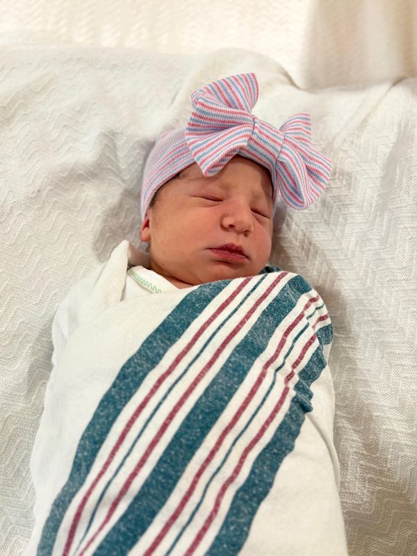 Julia Elizabeth Flemming was the first baby born in the new year in Metro Detroit, arriving at 12:03 a.m. on January 1, 2026, at Henry Ford Macomb Hospital. She is the daughter of Stacy and Daniel Flemming of Warren.