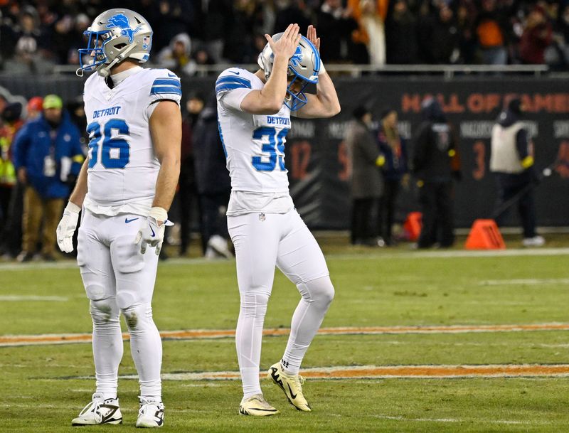Detroit Lions place kicker Jake Bates reacts after missing a field goal against the Chicago Bears during the first half at Soldier Field in Chicago on Sunday, Jan. 4, 2026.