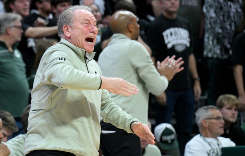 Jan 5, 2026; East Lansing, Michigan, USA; Michigan State Spartans head coach Tom Izzo sends in a play against the Southern California Trojans during the first half at Jack Breslin Student Events Center. Mandatory Credit: Dale Young-Imagn Images