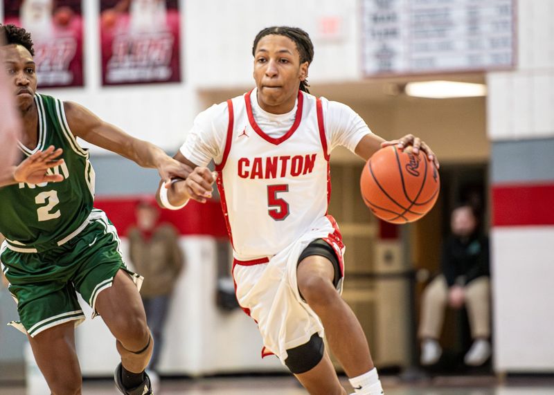 Canton's Jaylen Tramble dribbles up the floor during a Kensington Lakes Activities Association-West boys basketball game on Friday, Jan. 9, 2026.