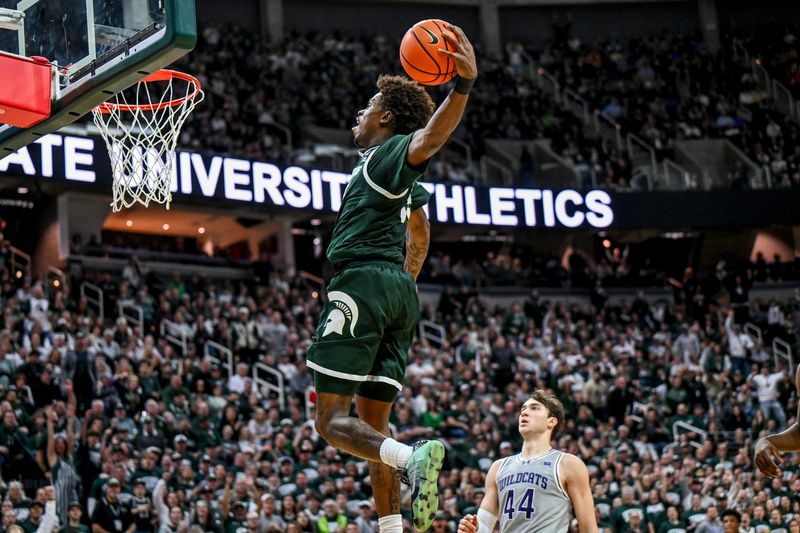Michigan State's Coen Carr dunks against Northwestern during the second half on Thursday, Jan. 8, 2026, at the Breslin Center in East Lansing.